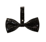 Black Snake Bowtie with silver Swarovski crystal closure on a black fabric background