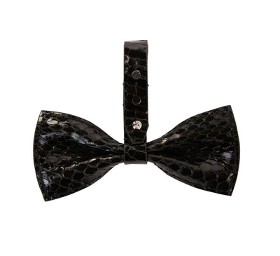 Black Snake Bowtie with silver Swarovski crystal closure on a black fabric background
