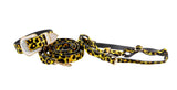 Yellow and black leopard print Italian leather belt with rhinestone-embellished buckle and matching adjustable dog leash with gold-tone hardware, displayed on white background.