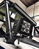 Black powder coated Polaris RZR pillar mounts installed on vehicle cage pillars