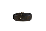 Dark brown Italian leather collar with bronze abstract leopard print pattern and small strap detail, shown in slight curve against a white background.