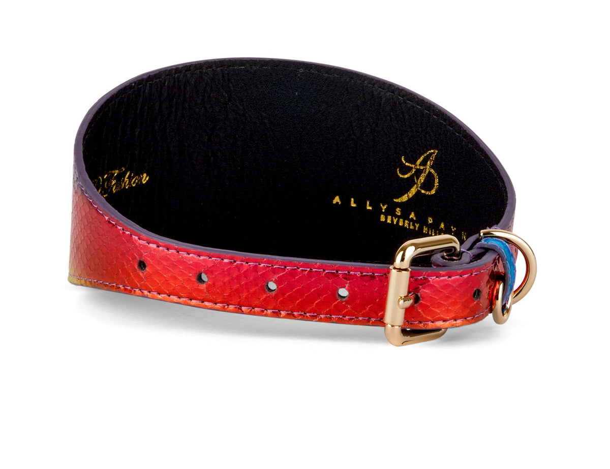 Red to orange gradient snake-patterned leather collar with gold buckle and black interior lining stamped with gold logo text.