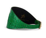 Emerald green snake-textured 4-inch wide collar with gold buckle and black inner lining stamped with gold logo lettering.