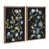 Two vertical framed canvas art pieces featuring stylized blue, green, and beige leaves and flowers on a black background by Nikita Jariwala.