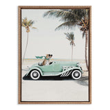 Framed canvas showing a stylized leopard wearing sunglasses driving a light green vintage car parked on a beach with tall palm trees under a pale sky.