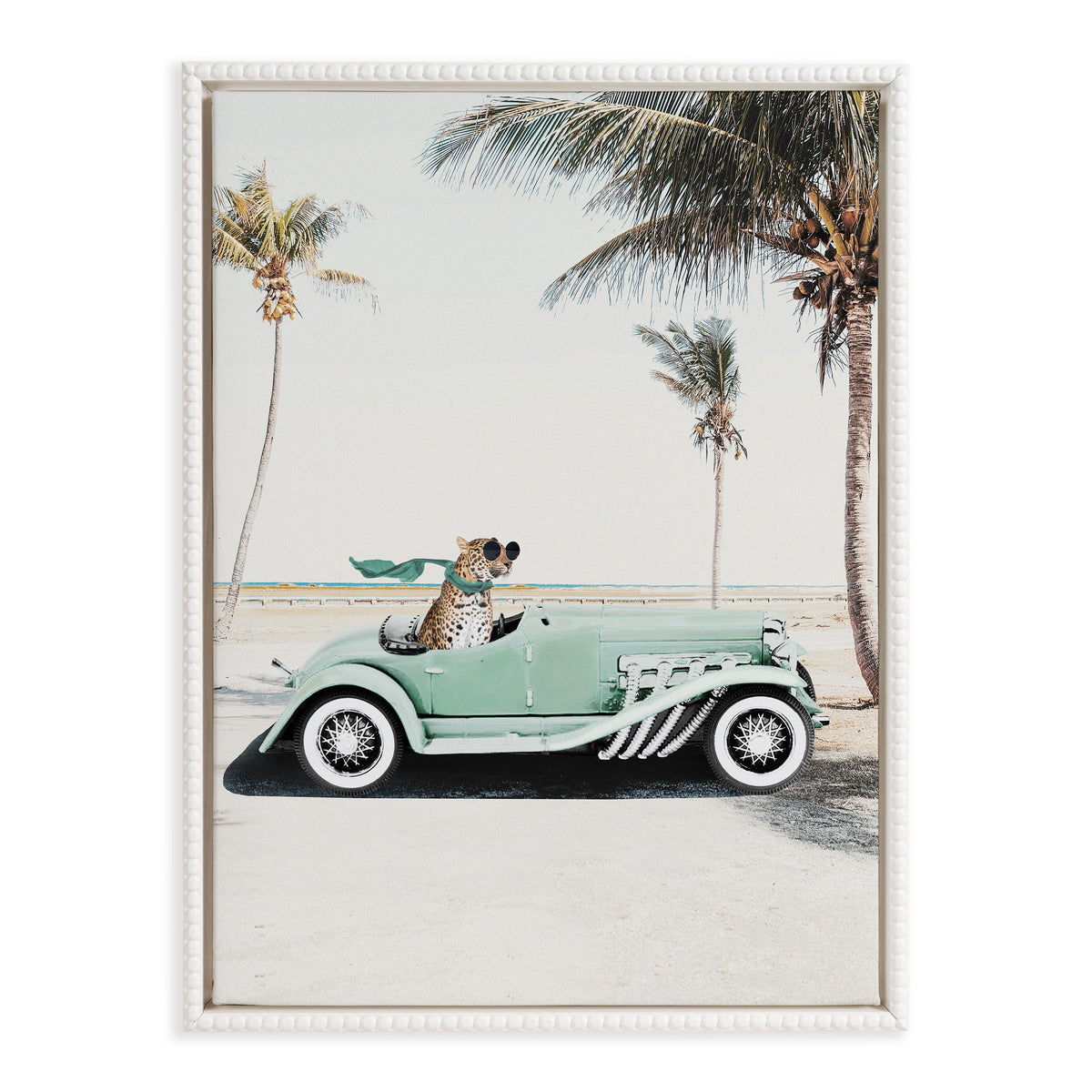 Illustration of a leopard wearing sunglasses and a green scarf, seated in a vintage mint green car parked on a beach with palm trees and a clear sky.