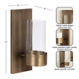 Wall sconce with 12x5 inch vertical ribbed metal backplate in antique brass finish and a 6-inch glass cylinder holder for standard flameless pillar candles