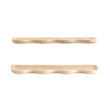 Two light wood shelves with smooth curved front edges and rounded sides, shown from a side view against a white background.