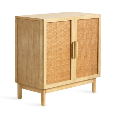 Ori Rattan Accent Floor Cabinet showing natural wooden frame with rattan door faces in a room setting