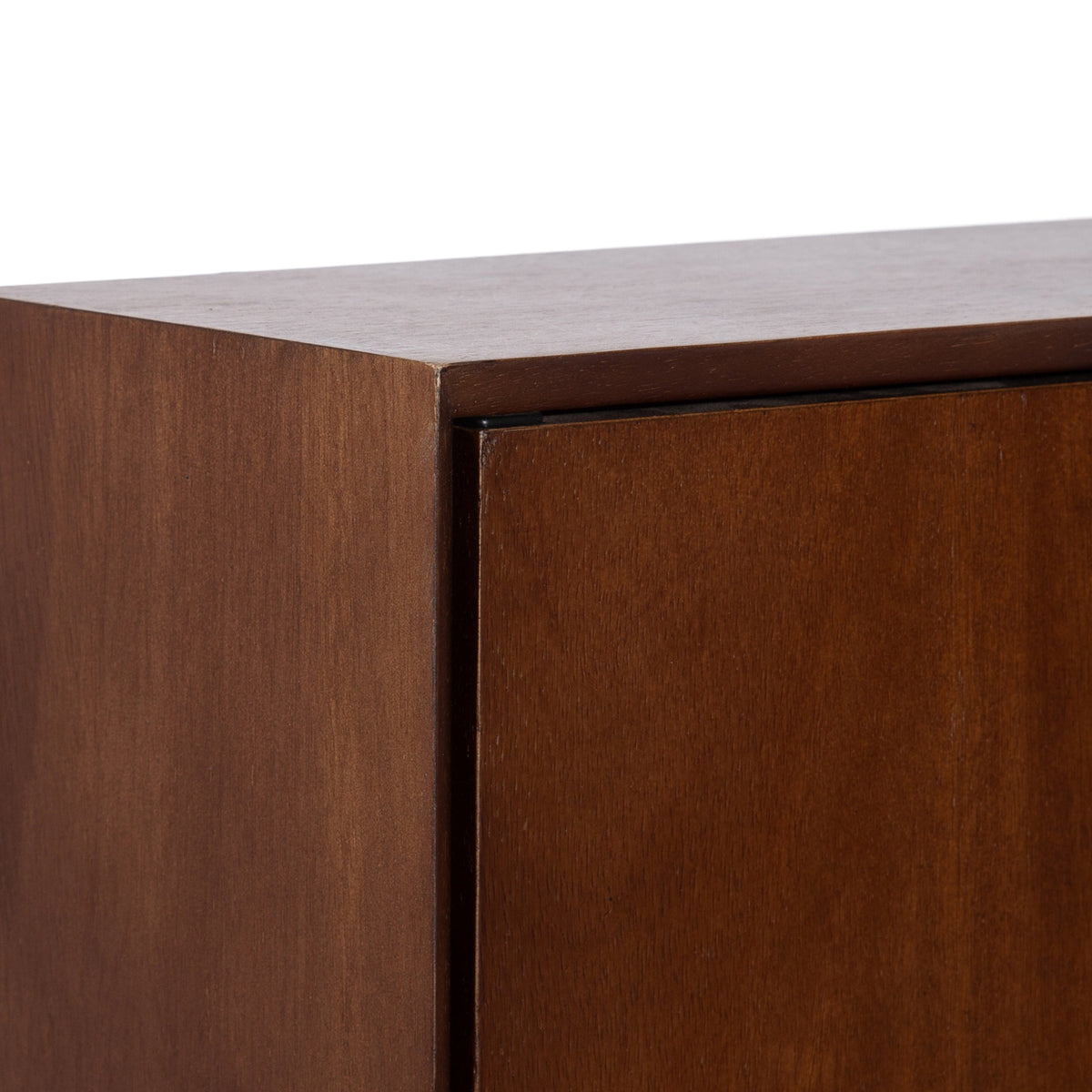 Close-up of a corner detail of the McCutcheon Floating Bathroom Cabinet showing its smooth brown wood finish and minimalist, handle-less door design.