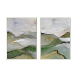 Two framed abstract paintings depicting misty hills with blended greens, grays, and white tones creating soft, flowing landscape forms under cloudy skies.