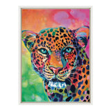 Framed canvas featuring a vibrant, multicolored leopard portrait with turquoise eyes against a background blending orange, pink, and green hues.