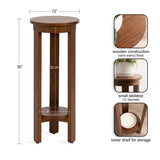 Tall round wood side table with warm walnut finish, featuring a 12-inch diameter tabletop and a lower storage shelf within four straight legs.