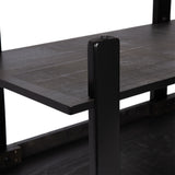 Close-up of dark wood shelf supported by black metal vertical frame with visible screw top, highlighting industrial design details of a rectangular table.