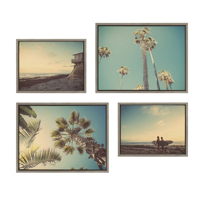 Four framed canvas artworks showing coastal scenes including a house on the beach, palm trees, sunbursts, and surfers