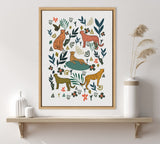 White canvas with framed artwork of four stylized cheetahs in various poses surrounded by green leaves, orange flowers, and abstract shapes in earth tones.
