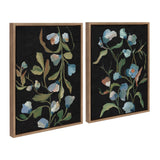 Two framed canvas paintings featuring blue and white flowers with green leaves on a black background, presented side by side in wooden frames.