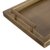 Close-up of a rectangular decorative tray corner with a brushed antique brass finish and a cylindrical handle attached with two posts