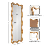 Tall rectangular mirror with a wavy, scalloped natural rattan wrapped frame measuring 48 by 22 inches, with sawtooth hangers for vertical or horizontal mounting.