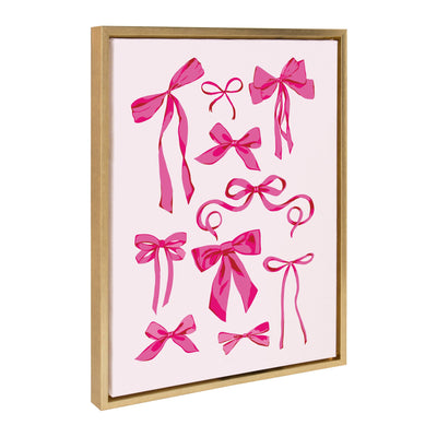 Sylvie Pink Bows framed canvas art featuring pink bows on a golden background with a modern lightweight polystyrene frame.