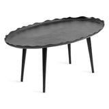 Oval black coffee table with a wavy textured top edge and four tapered round legs viewed slightly from above on white background.