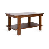 Rectangular wooden coffee table with a warm brown finish, featuring a thick top and a lower shelf supported by four square legs.