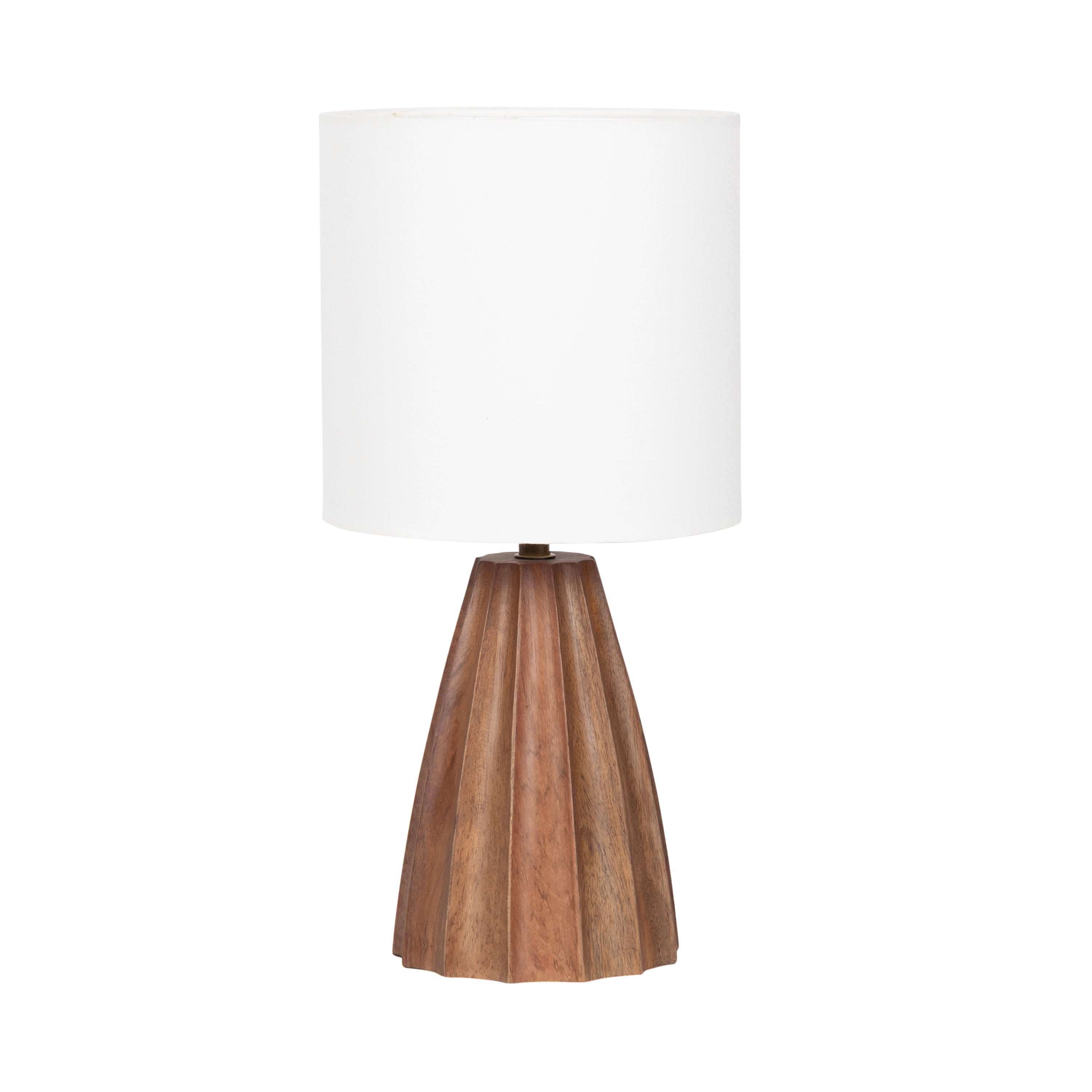 Ciji Scalloped Table Lamp with scalloped geometric base and white linen drum shade on tabletop