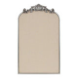 Rectangular beige fabric pinboard with an arched top and decorative silver scrollwork framing the arch's peak.