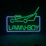 Green and white neon sign depicting a lawn mower above the text 'LAWN-BOY' in green, all enclosed in a white rectangular border on a black background.
