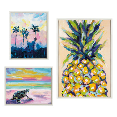 Set of three framed canvas art prints including Pineapple Study No 2, Apache Junction Sunset, and Sunset Sea Turtle