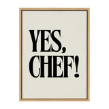 Framed canvas print with bold black text reading 'YES, CHEF!' on a white background inside a light wood frame.