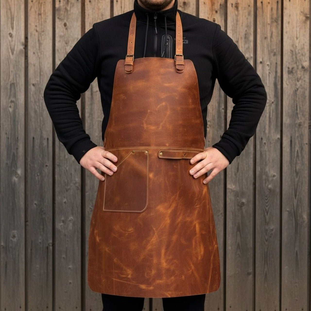 Handcrafted leather work apron with adjustable straps and front pockets by Sharky Forged Steel Tools