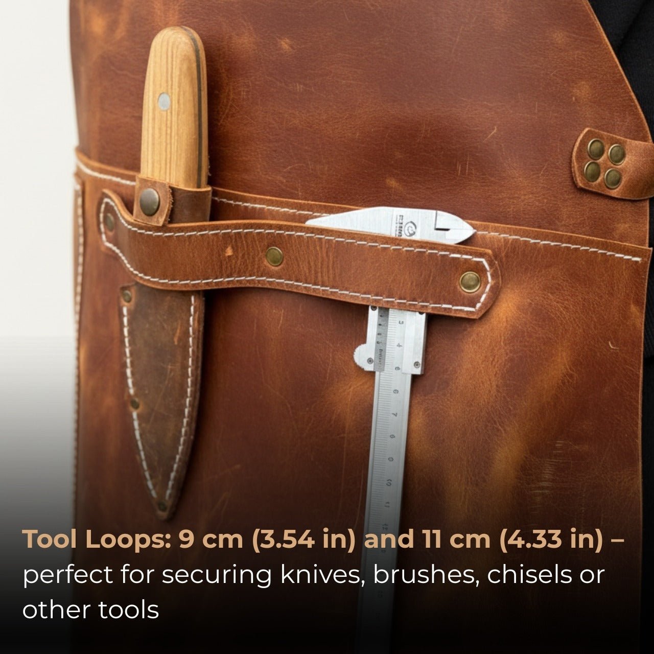 Handcrafted leather work apron with adjustable straps and front pockets by Sharky Forged Steel Tools