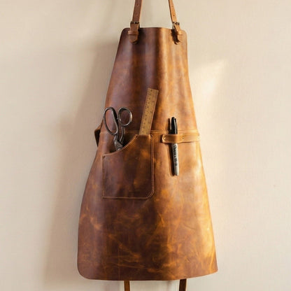 Handcrafted leather work apron with adjustable straps and front pockets by Sharky Forged Steel Tools