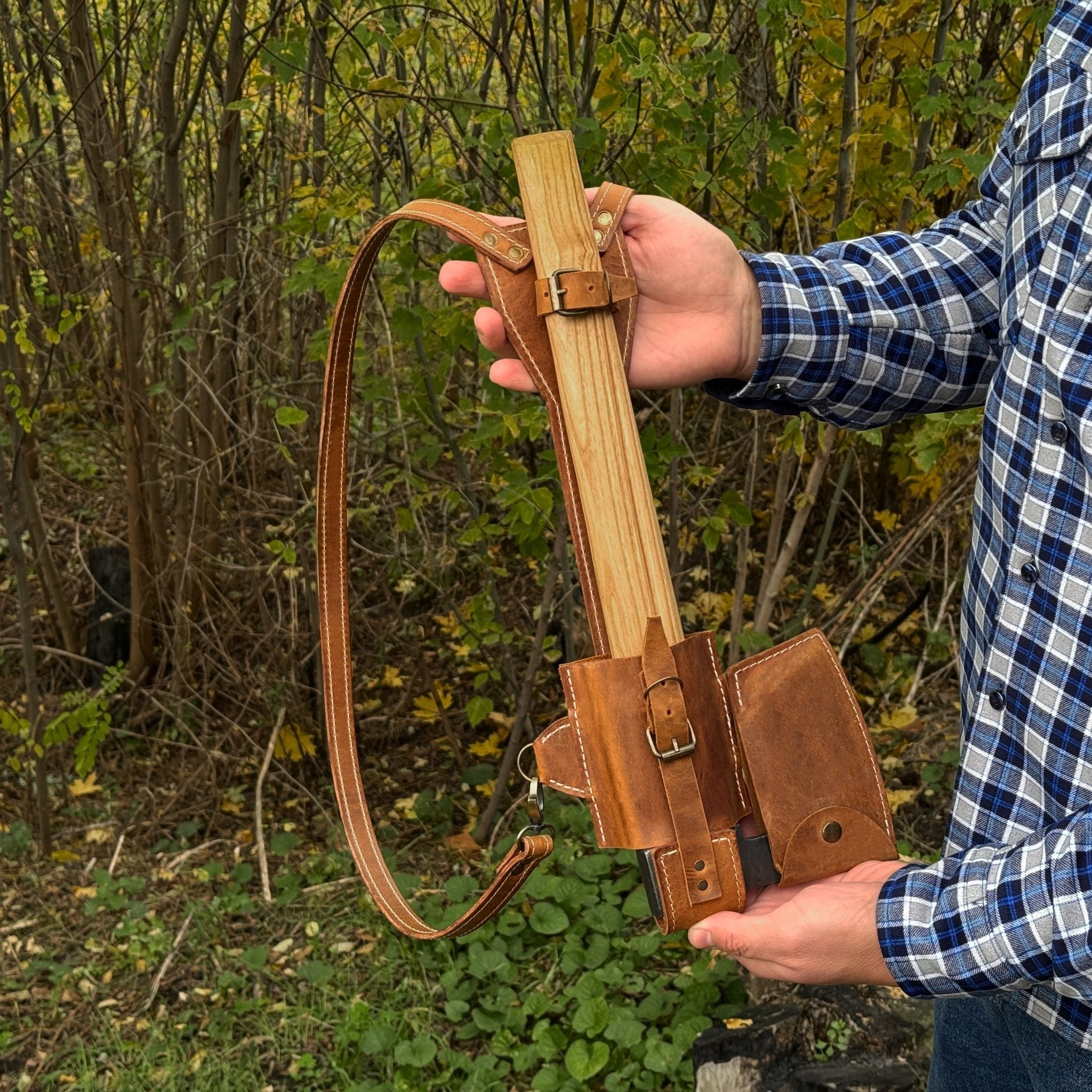 Leather axe case with adjustable shoulder straps by Sharky Forged Steel Tools