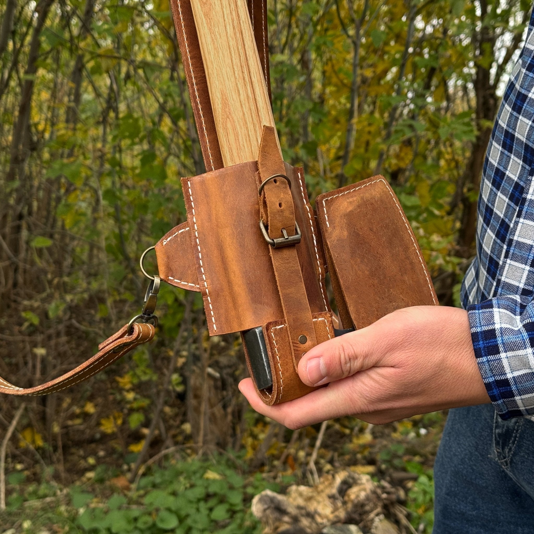 Leather axe case with adjustable shoulder straps by Sharky Forged Steel Tools