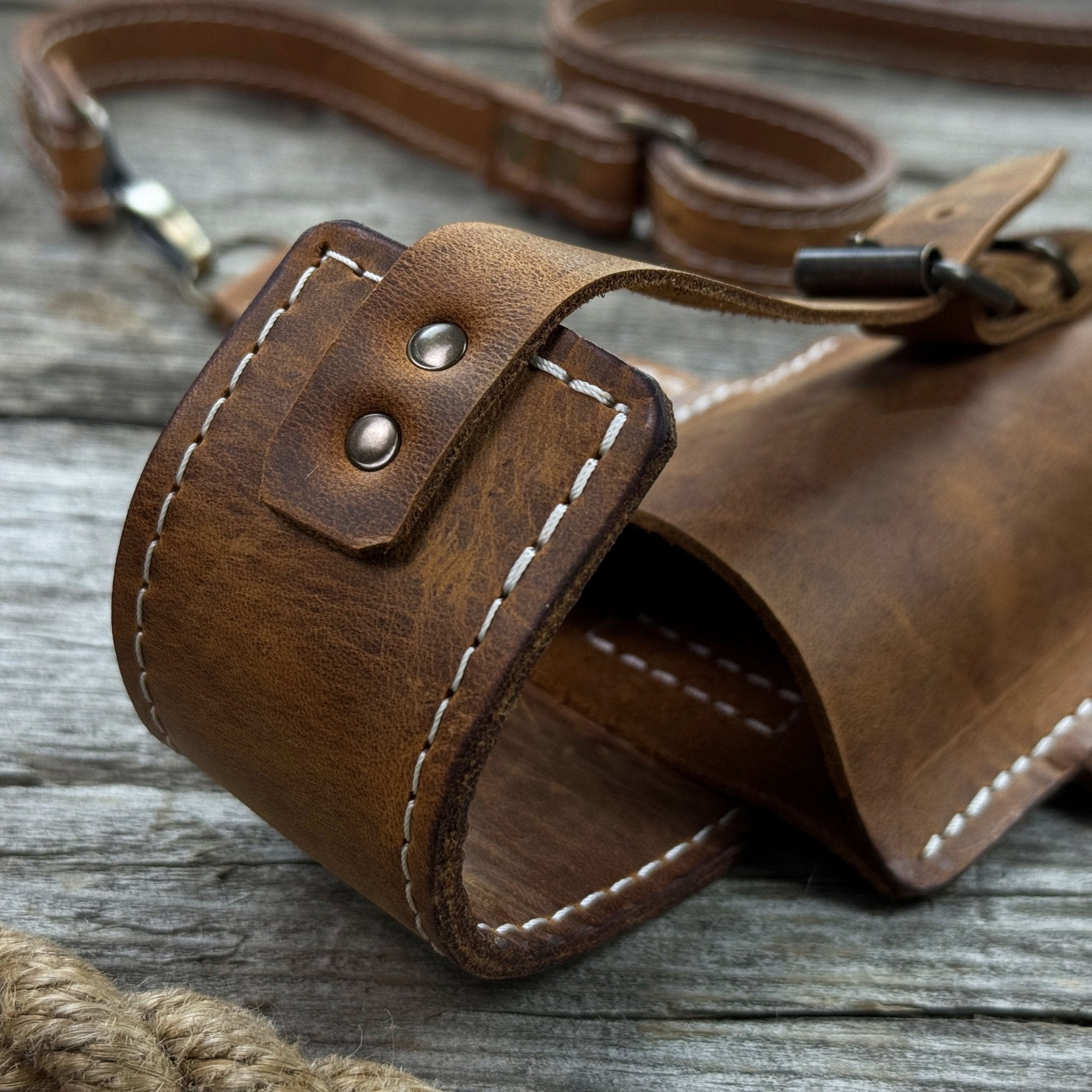 Leather axe case with adjustable shoulder straps by Sharky Forged Steel Tools
