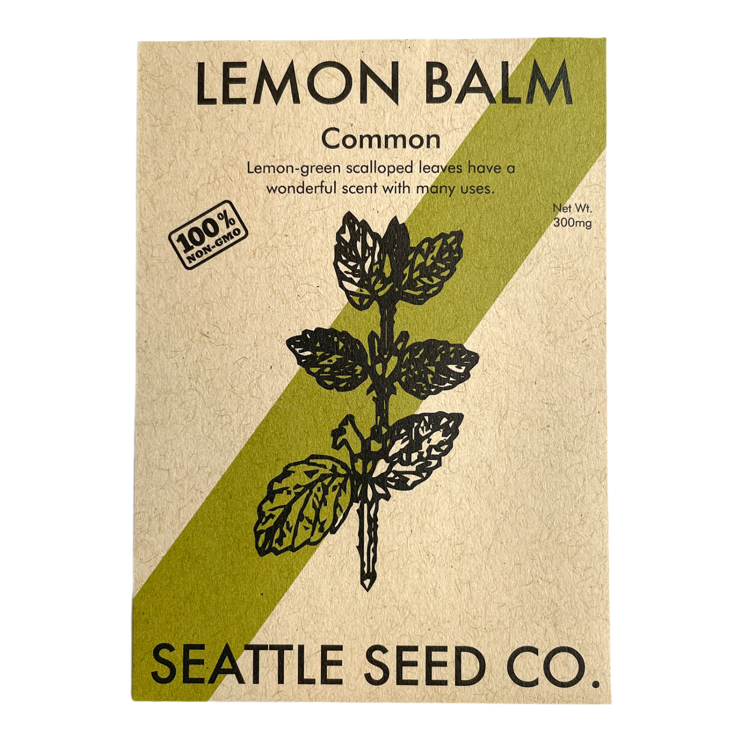 Lemon Balm plant with bright green leaves and lemony aroma, shown growing in a garden setting.