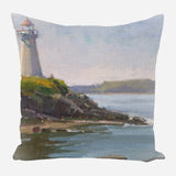 Square pillow depicting an oil painting of a white lighthouse on a rocky shoreline with green grass, overlooking a calm blue sea under a pale sky.