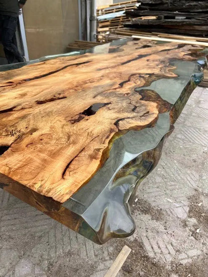 Solid linden wood dining table with natural epoxy resin finish and customizable wooden legs