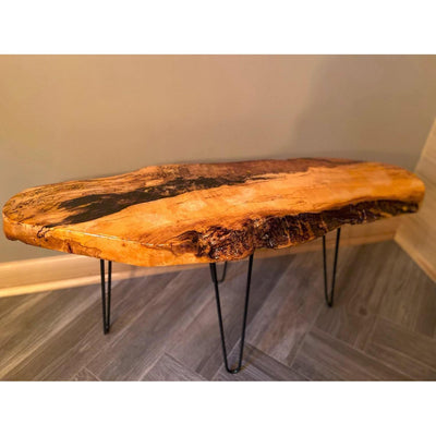 Clear epoxy resin coating on bar top and table surfaces