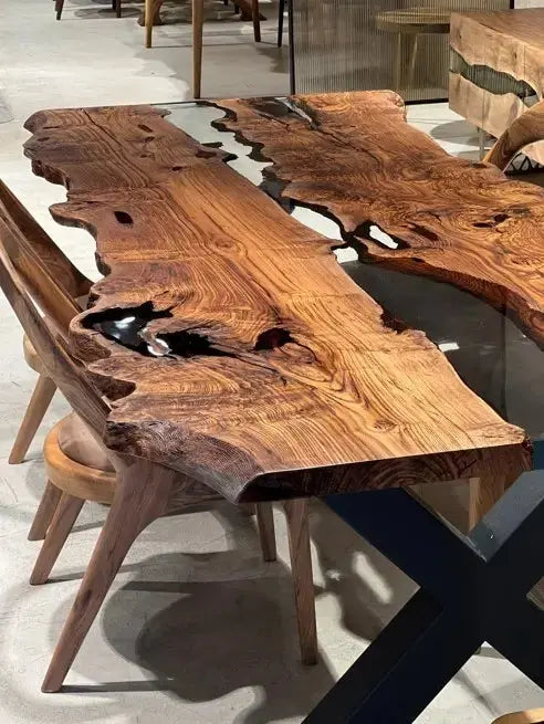 Live edge chestnut wood dining table with epoxy resin river and black legs