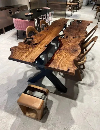 Live edge chestnut wood dining table with epoxy resin river and black legs