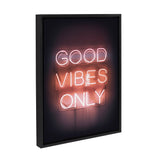 Framed canvas art with black background and neon style lettering that reads 'Good Vibes Only'.