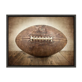 Sylvie Vintage Football framed canvas art in a modern floating polystyrene frame, shown hung on a wall.