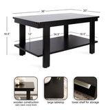 Black rectangular coffee table with satin wood finish, a large tabletop, and a lower storage shelf between four square legs, dimensions overlaid.
