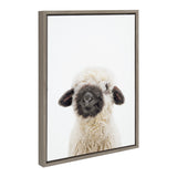 Sylvie Animal Studio Black Nosed Sheep framed canvas art showing a black-nosed sheep in soft earth tones with a floating polystyrene frame