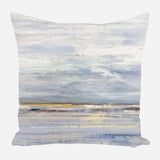 Square pillow with an abstract watercolor landscape design featuring muted blues, grays, and hints of yellow, mimicking a serene sky and reflective water scene.
