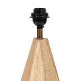 Table lamp base with a geometric, light wood pyramid shape and black and brass lamp holder hardware on top.