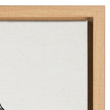Close-up of a light wood frame corner with white textured canvas inside, showing a minimalist and natural finish.